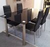 Picture of Melody Dining Table Black Glass 1.5X0.9m with 4 Black Mila Dining Chair