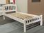 White single bed with wooden frame