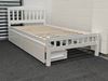Miki King Single Bed in white, crafted from solid rubberwood, featuring a slatted base and built-in storage drawers for practical organization.