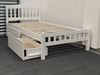 Miki King Single Bed in white, crafted from solid rubberwood, featuring a slatted headboard and footboard with built-in storage drawers for practical organization.