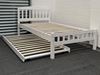 Miki King Single Bed in white, crafted from solid rubberwood, featuring a slatted headboard and footboard with a pull-out trundle for extra sleeping space.