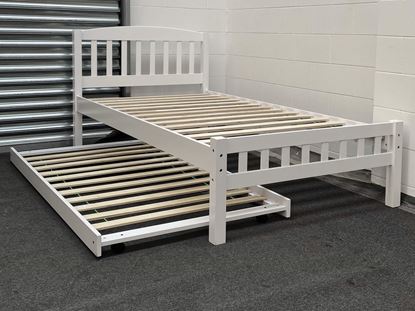 Miki King Single Bed in white, crafted from solid rubberwood, featuring a slatted headboard and footboard with a pull-out trundle for extra sleeping space.