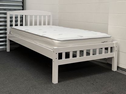 Miki King Single Bed in white, crafted from solid rubberwood, featuring a slatted headboard and footboard. The main bed is fitted with a comfortable mattress. Title: Miki King Single Bed – Solid Hardwood Frame with Mattress in White Let me know if you'd like any further refinements!