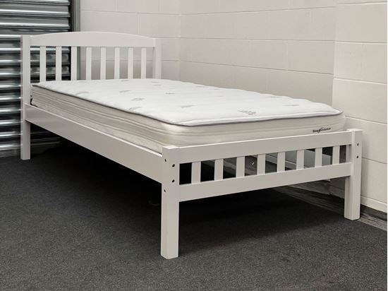 Miki King Single Bed in white, crafted from solid rubberwood, featuring a slatted headboard and footboard. The main bed is fitted with a comfortable mattress. Title: Miki King Single Bed – Solid Hardwood Frame with Mattress in White Let me know if you'd like any further refinements!