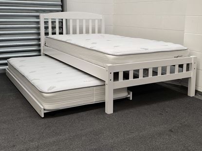 Miki King Single Bed in white, crafted from solid rubberwood, featuring a slatted headboard and footboard with a pull-out trundle for extra sleeping space. Both the main bed and trundle are fitted with comfortable mattresses